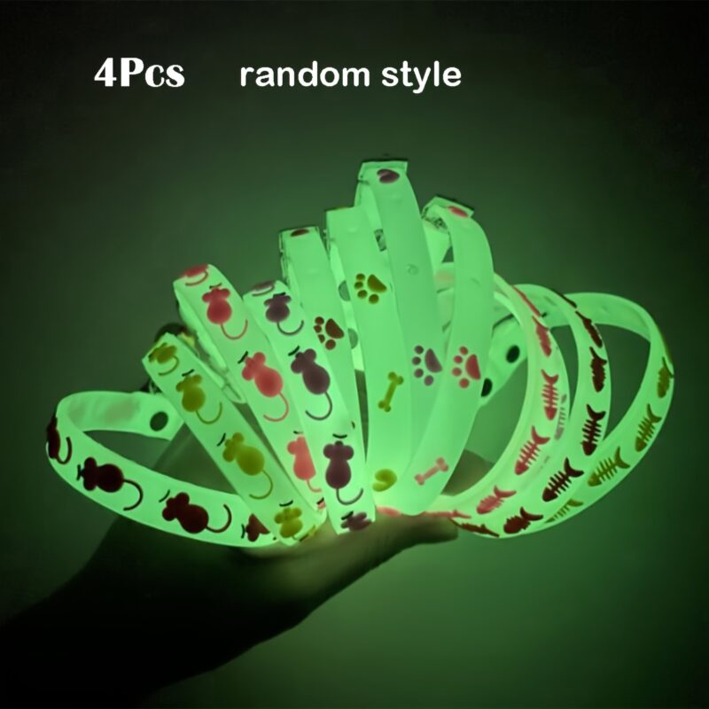 Švytinčios katės antkakliai su varpeliu – švytinčios antkakliai tinkami naktiniams pasivaikščiojimams, šviečia juodosios šviesos pojūtyje, atsitiktinė spalva